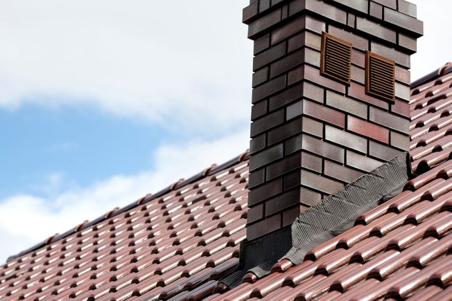 Newly installed roof with chimney